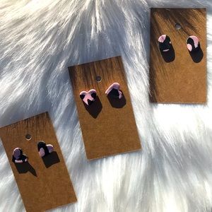 Pink and black cow printed studs